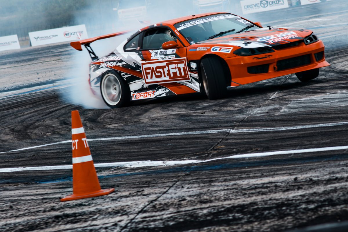 Orange FastFit S15 mid-slide past the cone