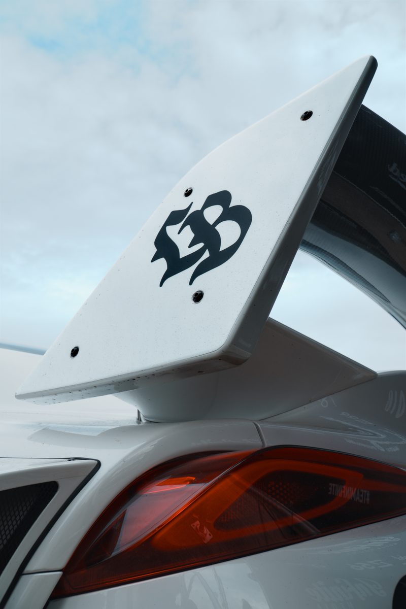 LB rear wing on a white Liberty Walk car