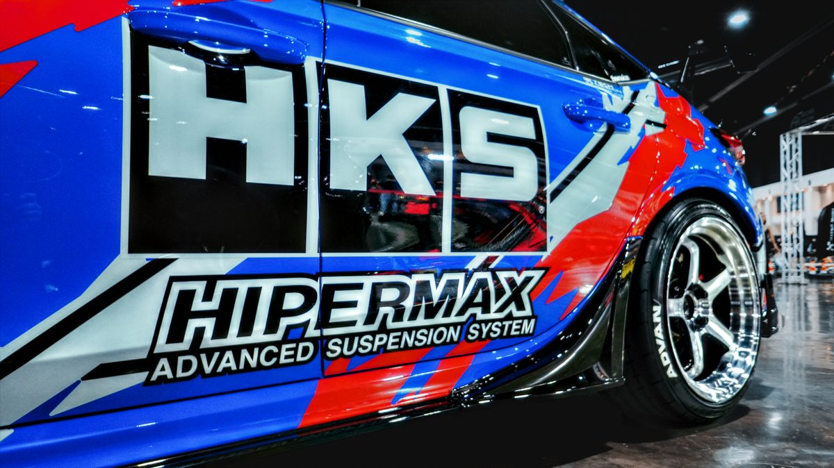 HKS Hipermax livery across the door of a blue Civic